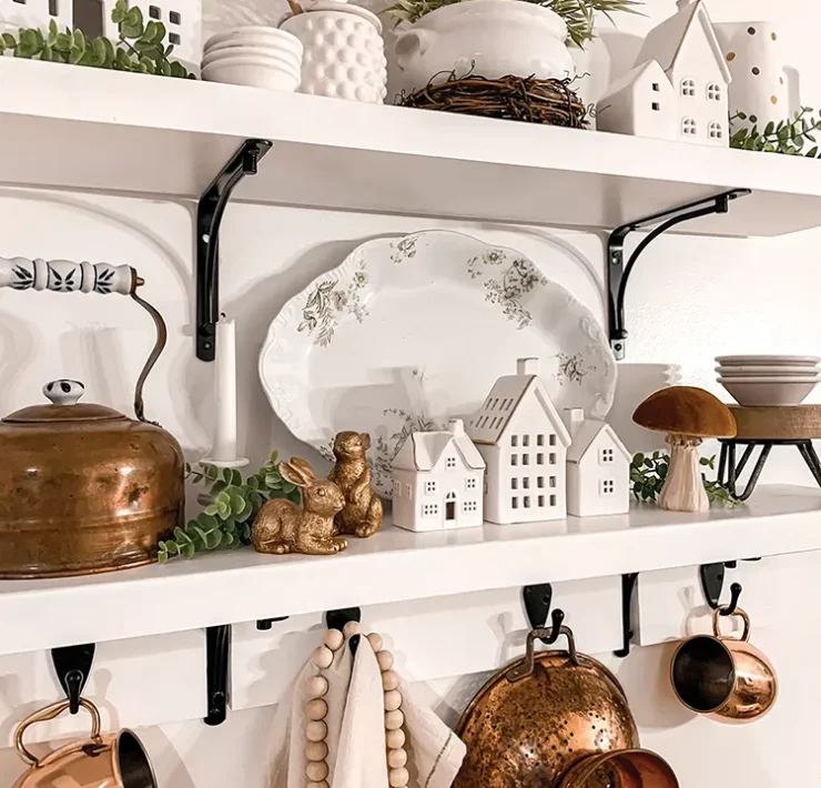 kitchen close up of exposed kitchen shelves with copper and white kitchenalia