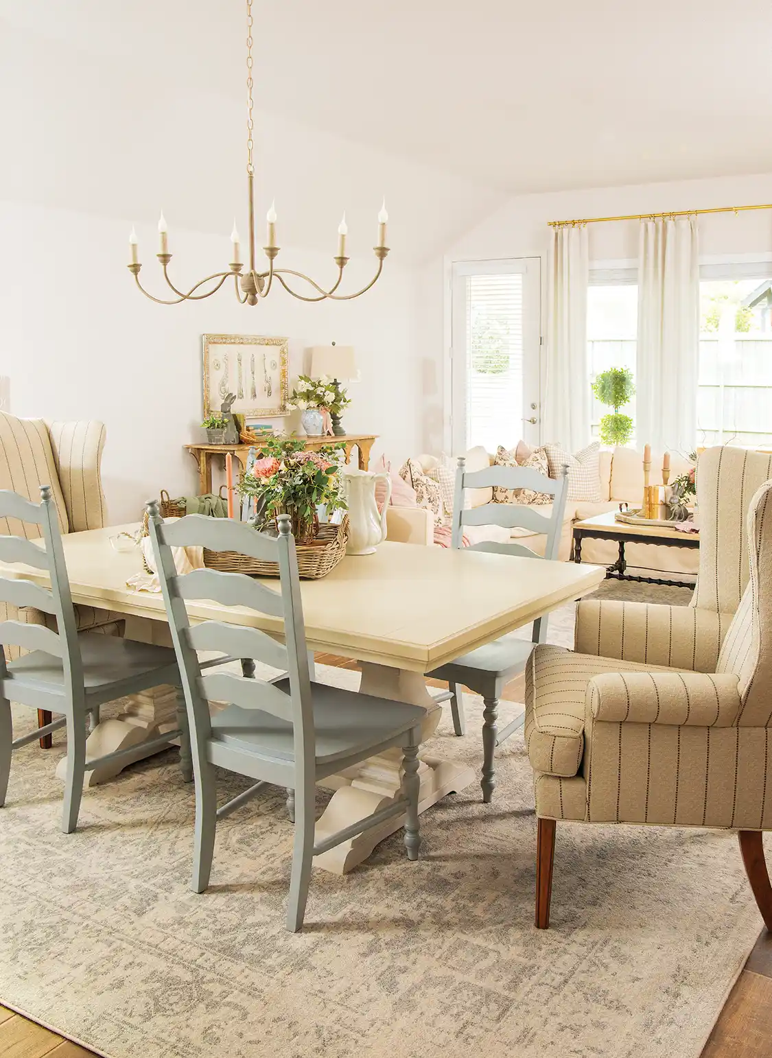 dining room with spring floral centerpiece in new build farm cottage with French country decor