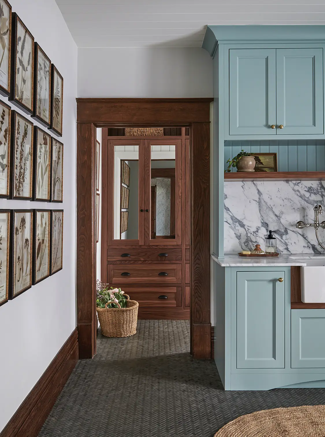 turquoise cabinetry and framed botanical prints in Craftsman Victorian farmhouse