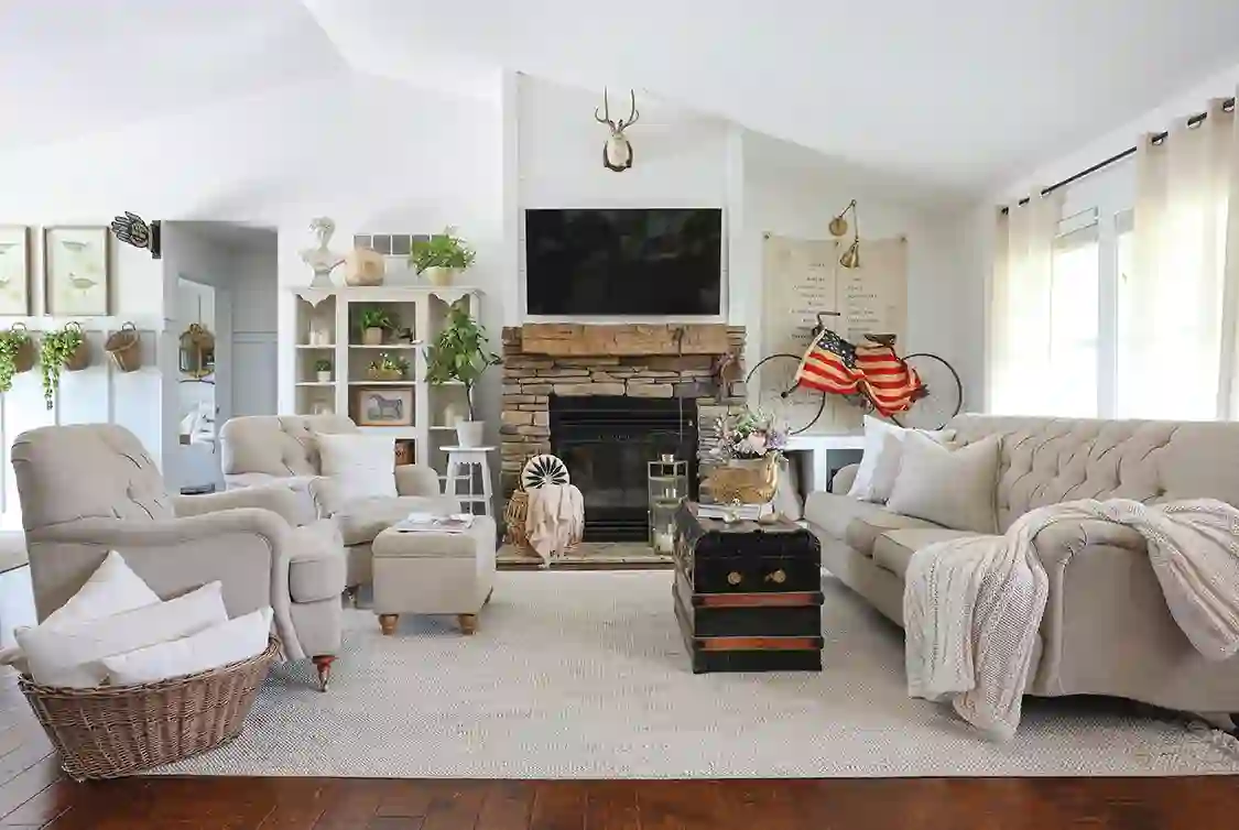 living room with natural stone fireplace