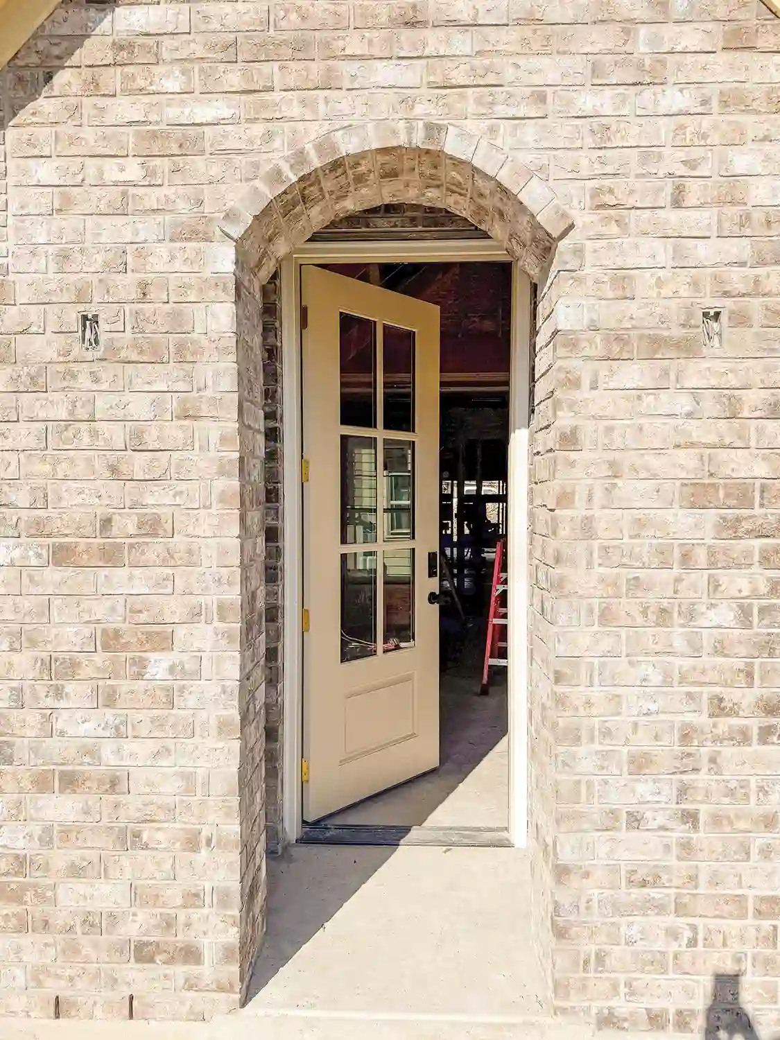 Project House Austin brick exterior entryway