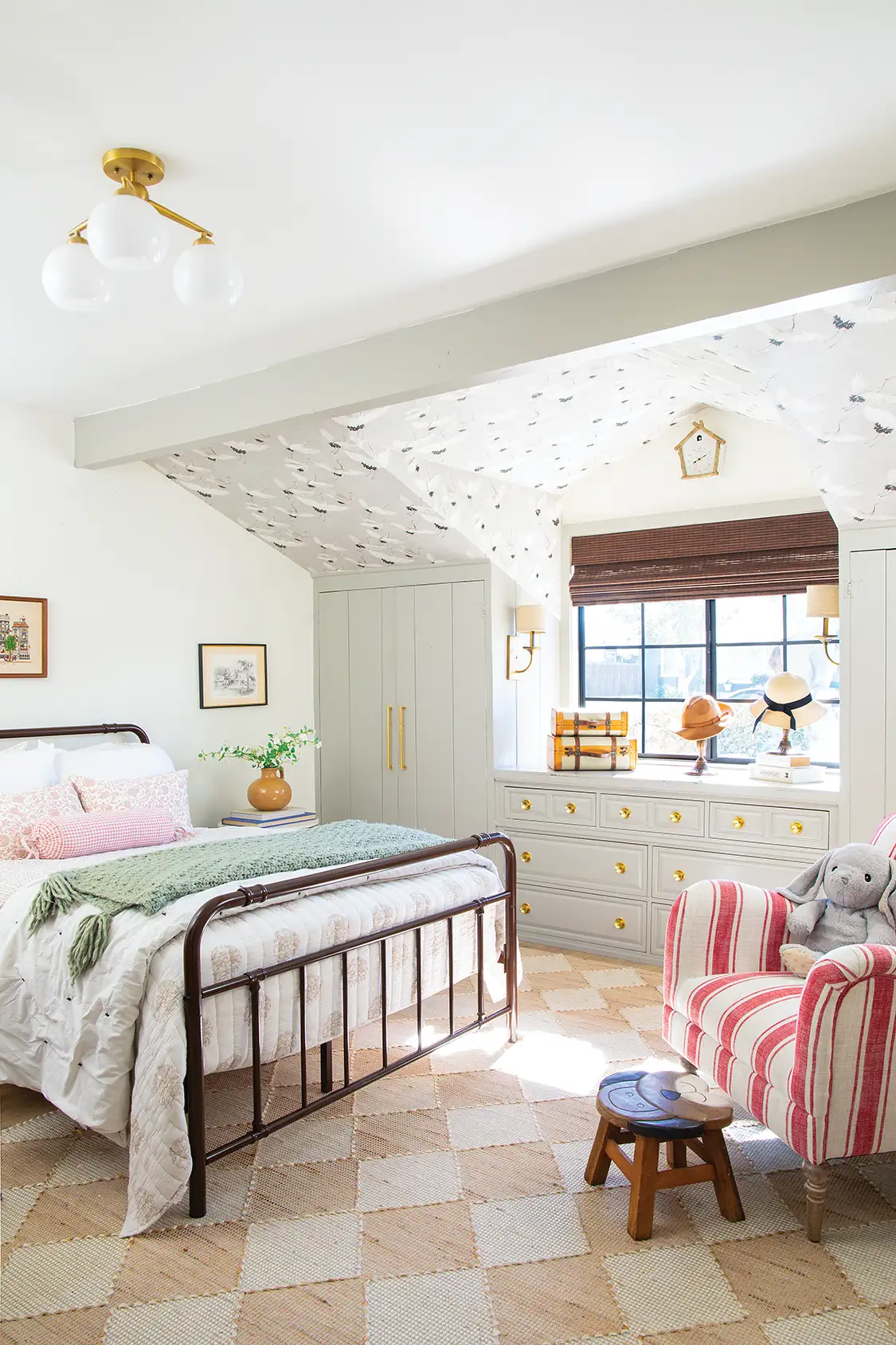 girls room with butterfly wallpaper