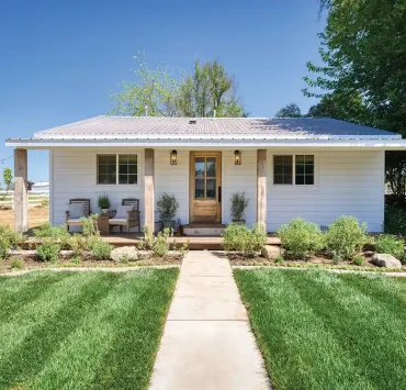 little house on a large property