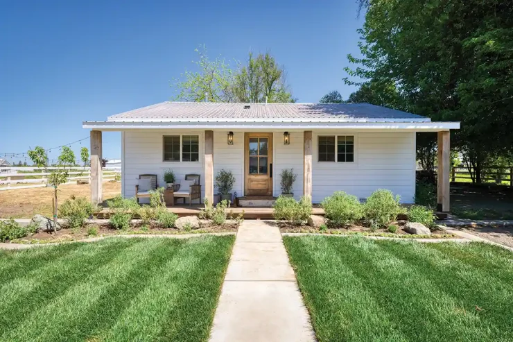 little house on a large property