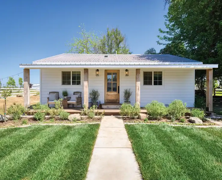 little house on a large property