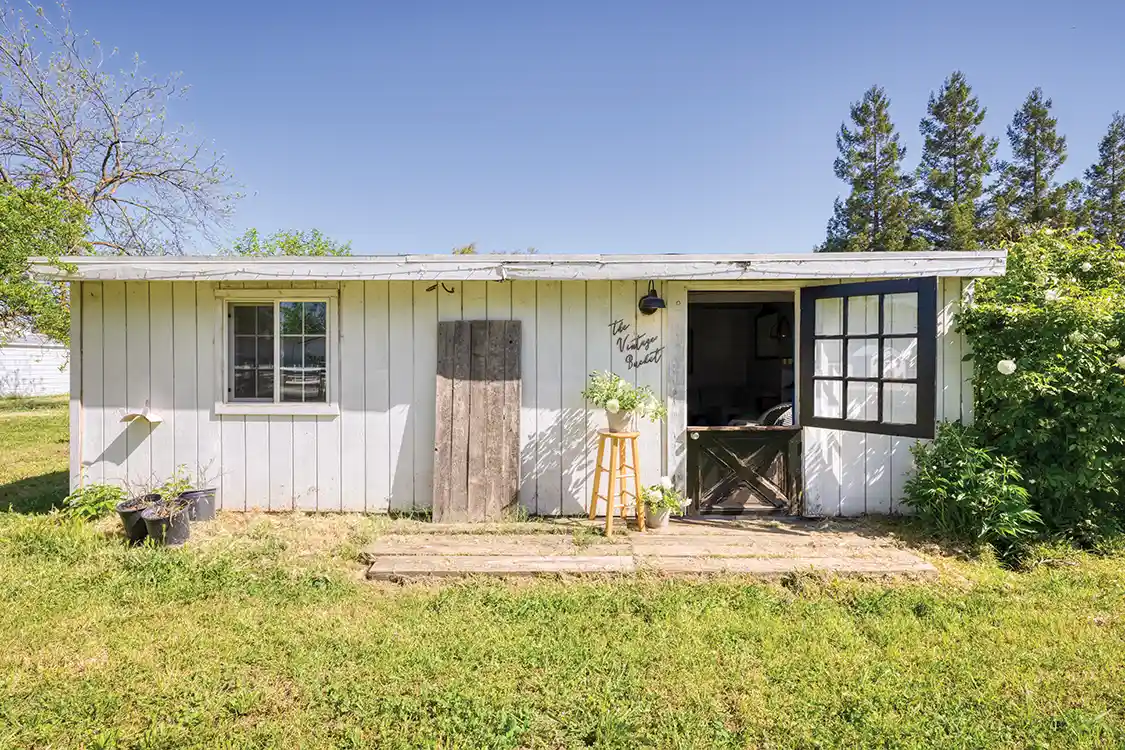 The Vintage Bucket gardening shed on large property in Northern California