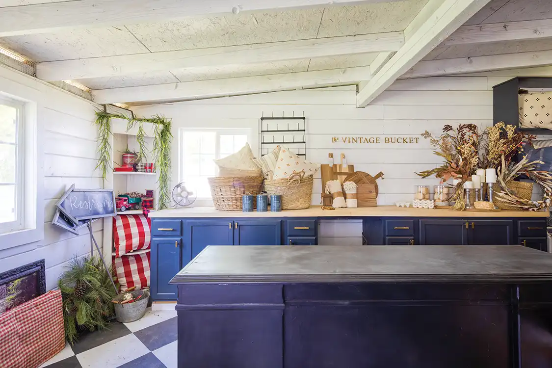 staging area for the Vintage Bucket with blue cabinetry and black and white checkered floors