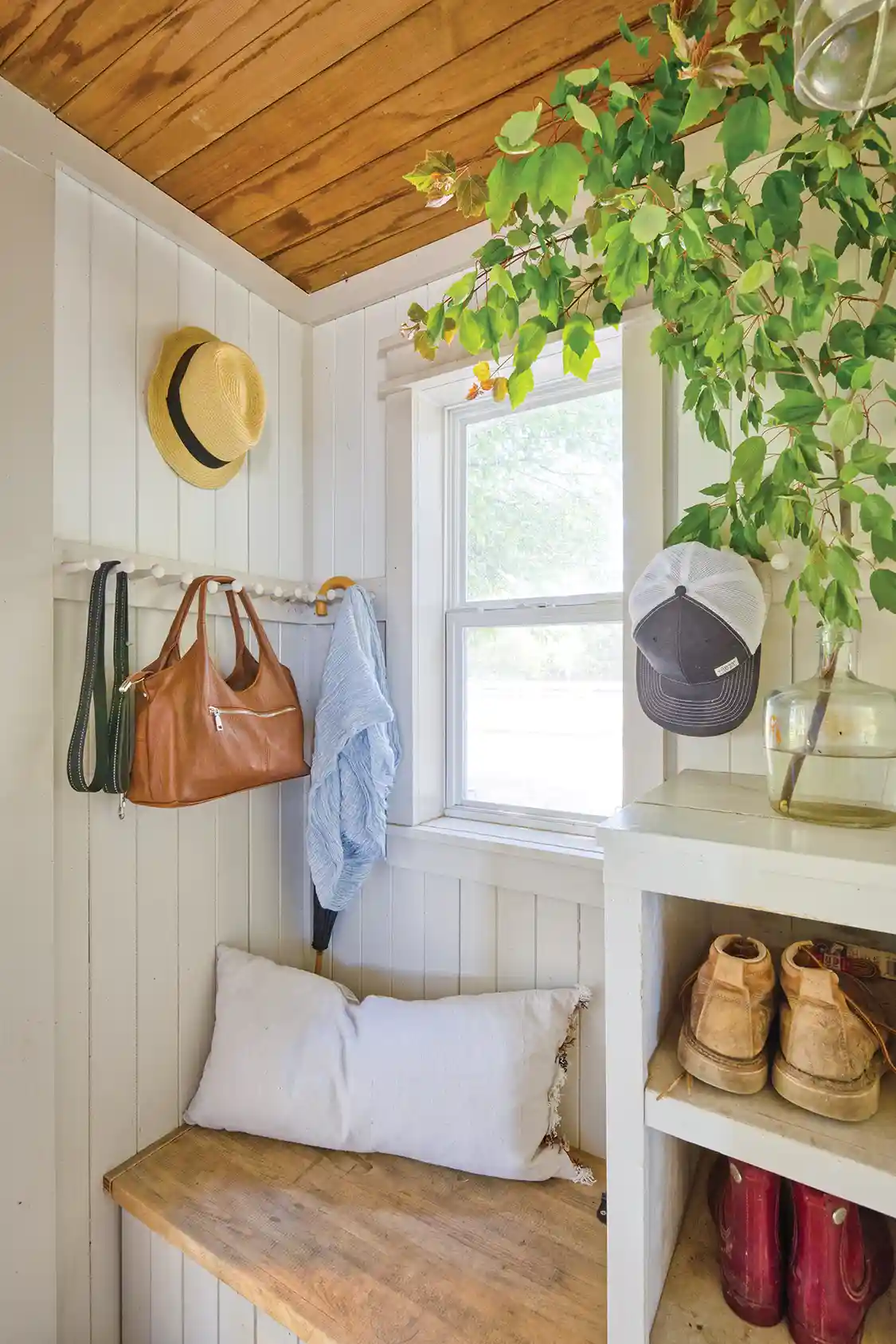 entryway peg hangers in little house on large property