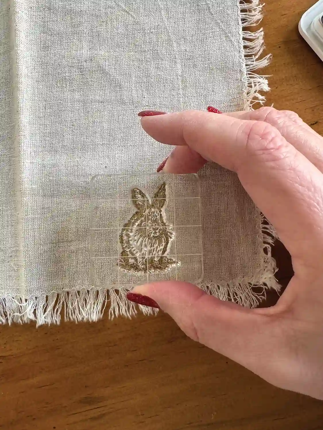 handstamping cloth napkin with bunny stamp
