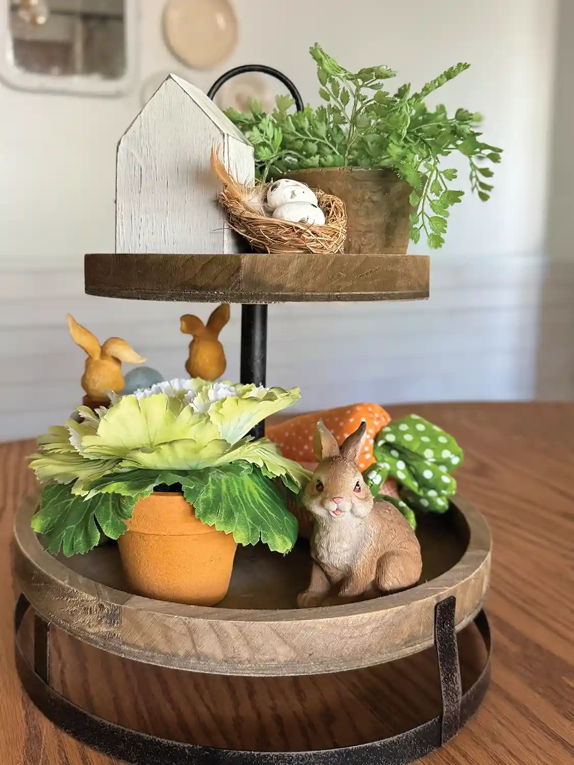 tiered tray with spring items for spring vignette