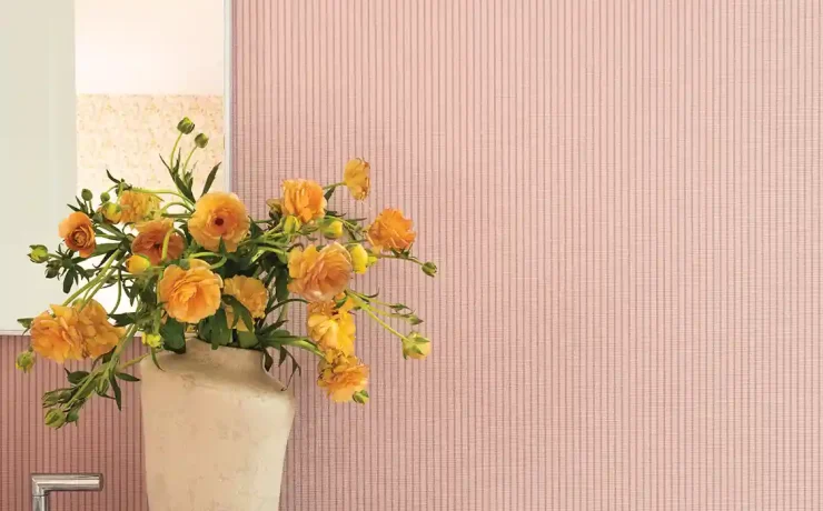 pink and white striped wallpaper in bathroom