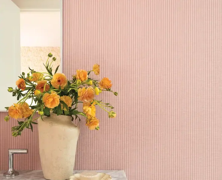 pink and white striped wallpaper in bathroom